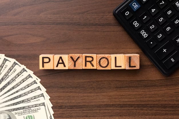 top-view-payroll-concept-with-cash-calculator_23-2149103971